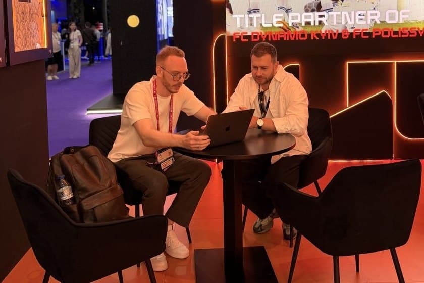 A laptop meeting at a stand at SBC Summit, Lisbon